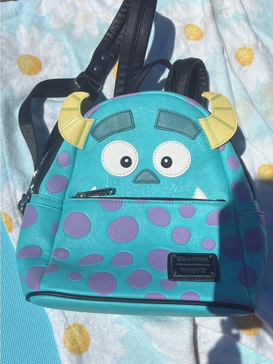 Loungefly Handbags - Loungefly Teal & Purple Sulley Mini Backpack with Yellow Horns